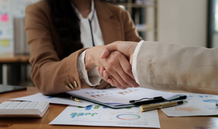 Fund business team has made a successful investment. business people shaking hand.